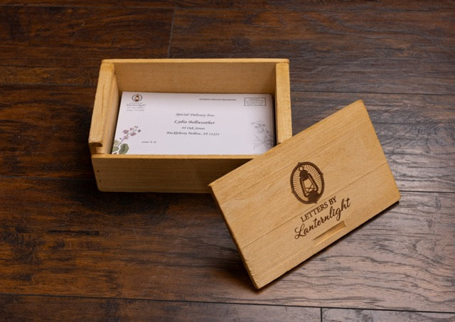 Wooden keepsake story chest for storing cozy mystery letters and clues