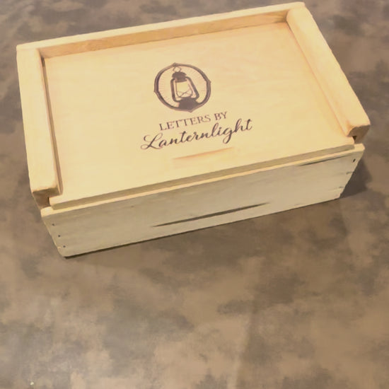Video showing Handcrafted wooden letter storage box with Letters by Lanternlight branding